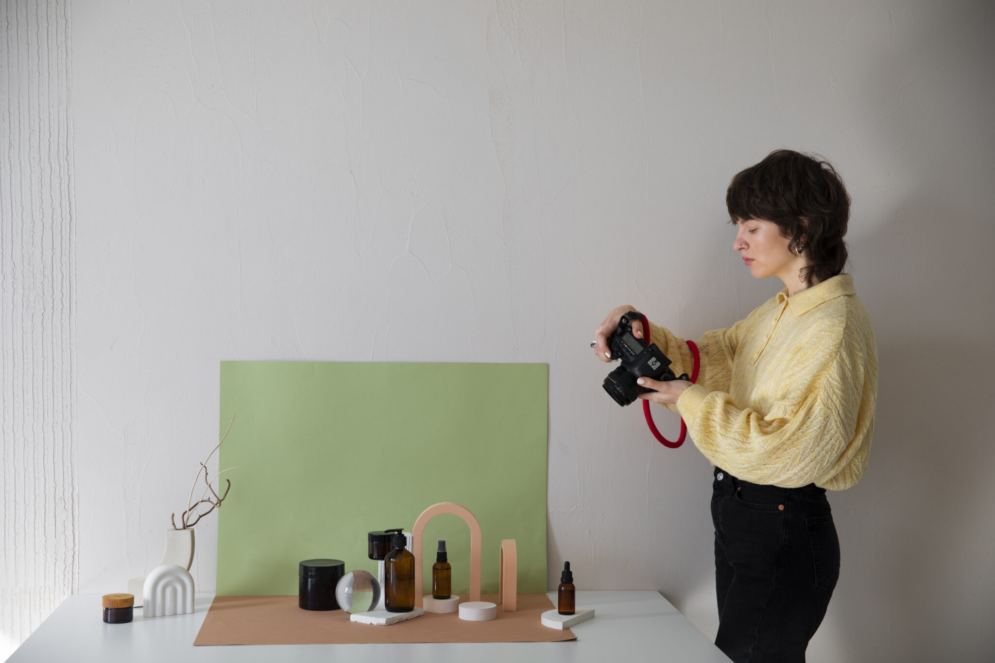 medium-shot-specialized-photographer-taking-photos