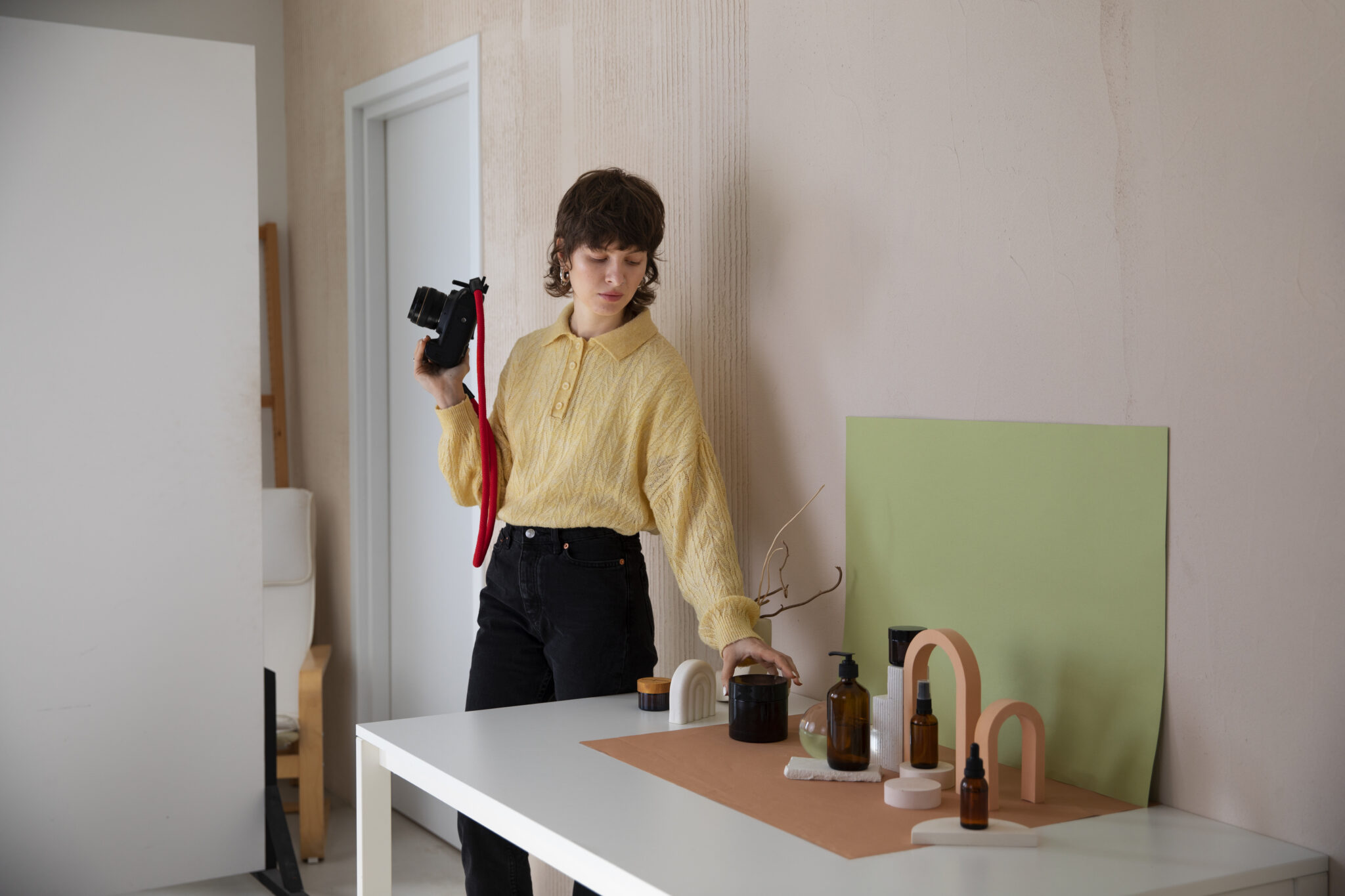 side-view-woman-working-photography-studio (1)